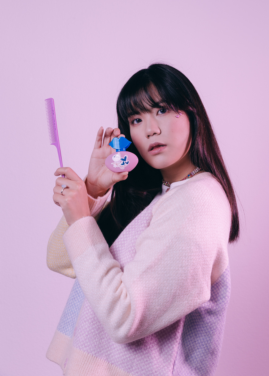 Soft Girl Holding Beauty Products